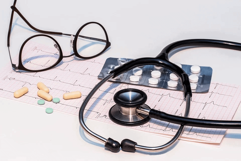 EKG, stethoscope, and medications